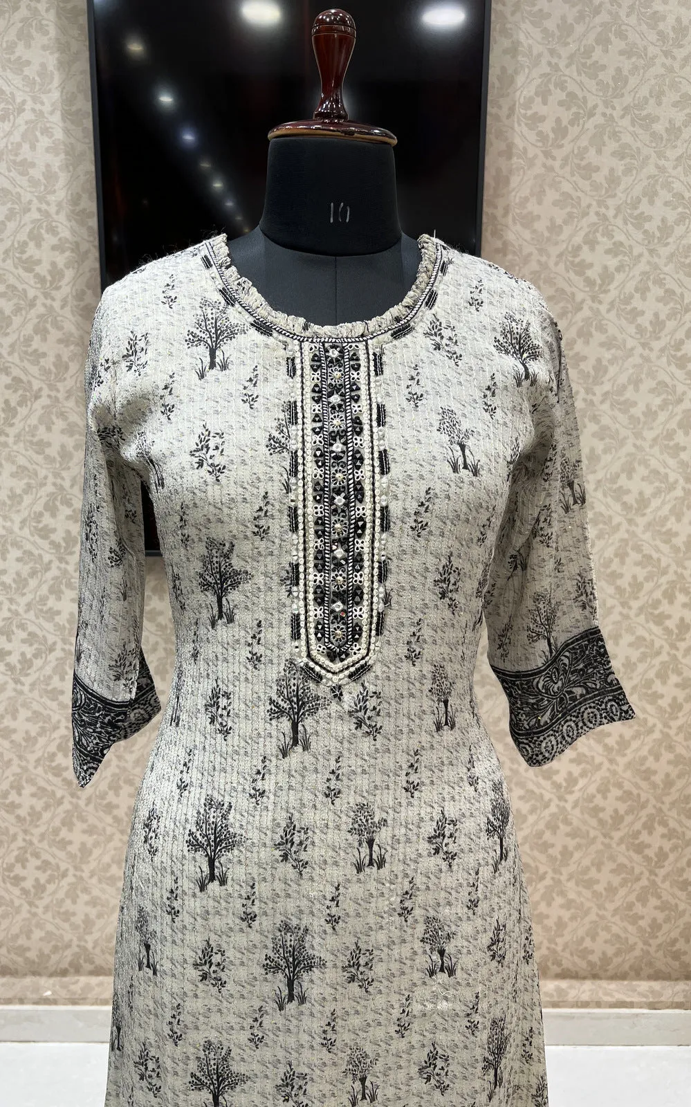 Cream with Black Printed, Sequins, Mirror and Thread Weaving work Calf Length Kurti
